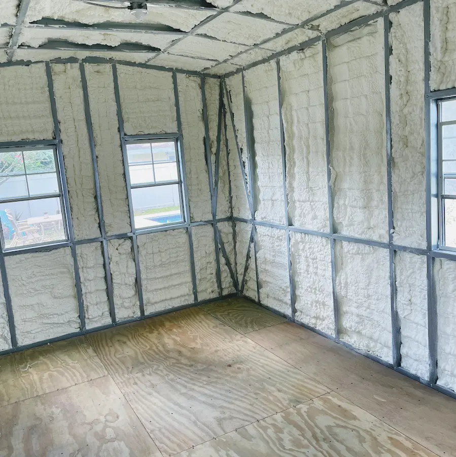 Closed-cell spray foam insulation applied to wall cavities in a residential project in Sherwood